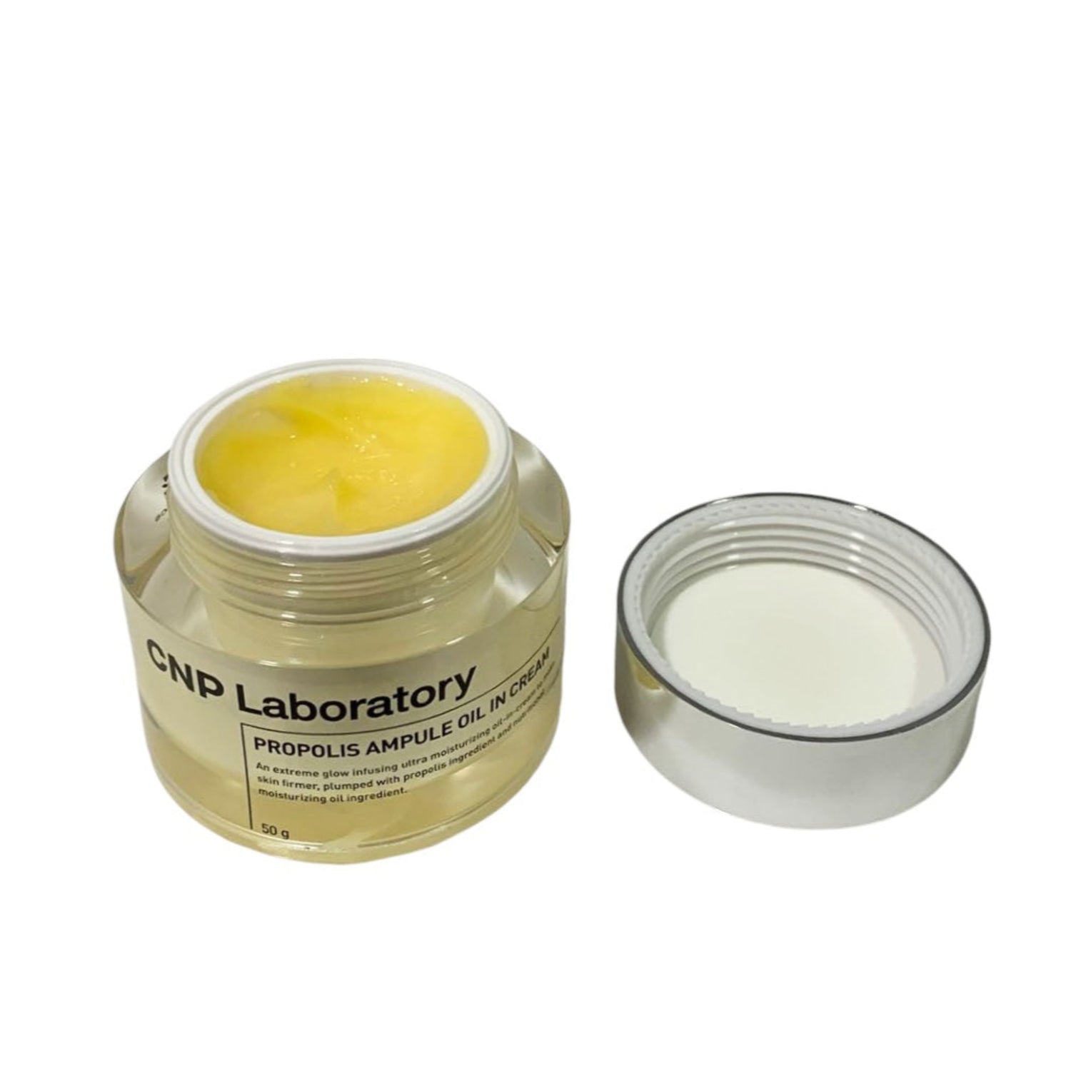 CNP Laboratory propolis ampoule oil product with open lid on a white background