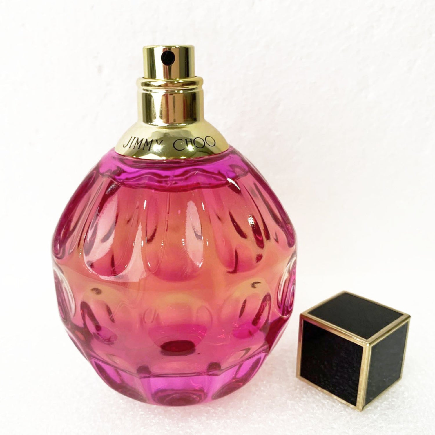Jimmy Choo Rose Passion EDP Tester - Product packaging with pink bottle and black cap box