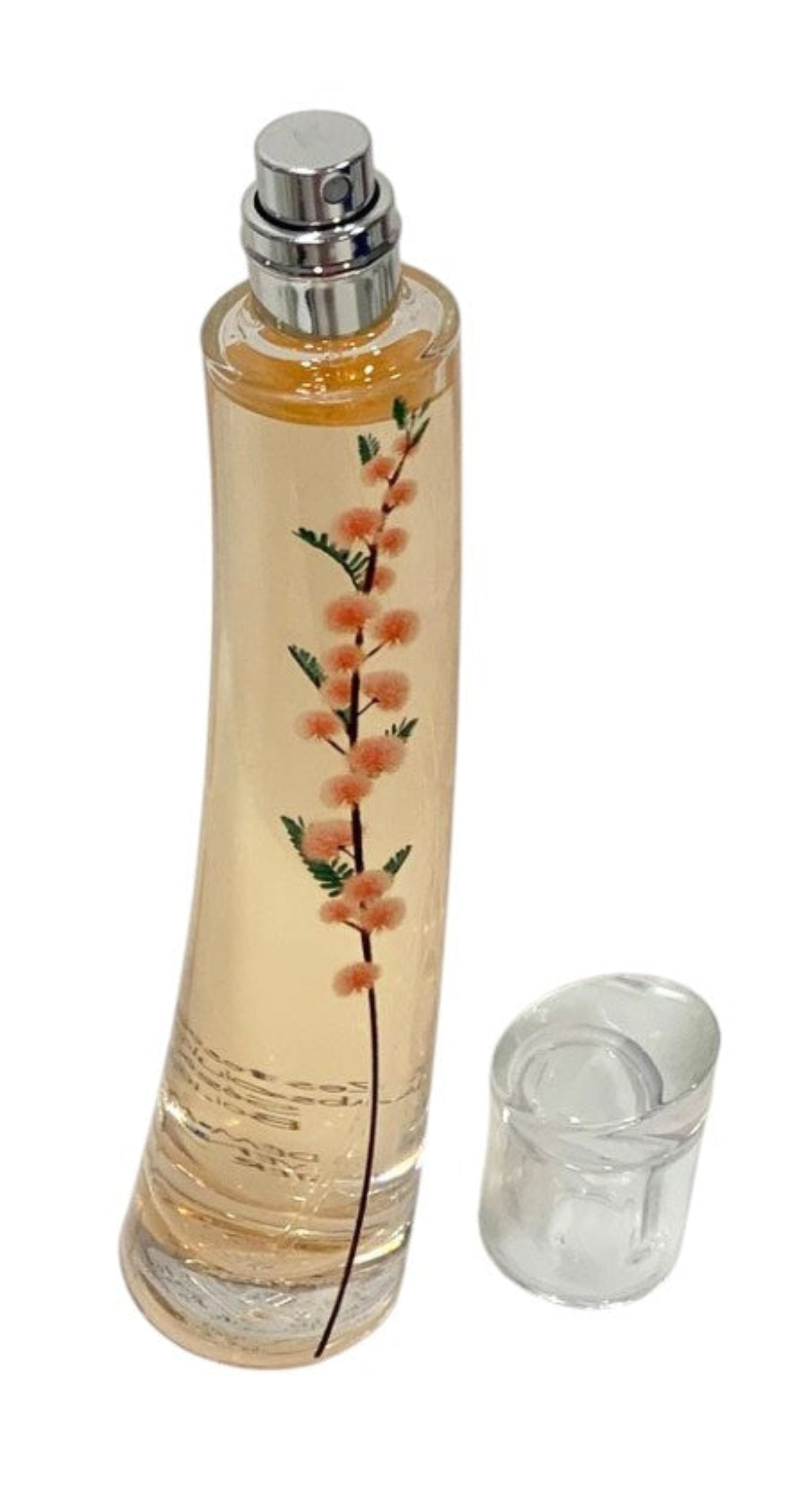 Perfume bottle with floral design on a white background