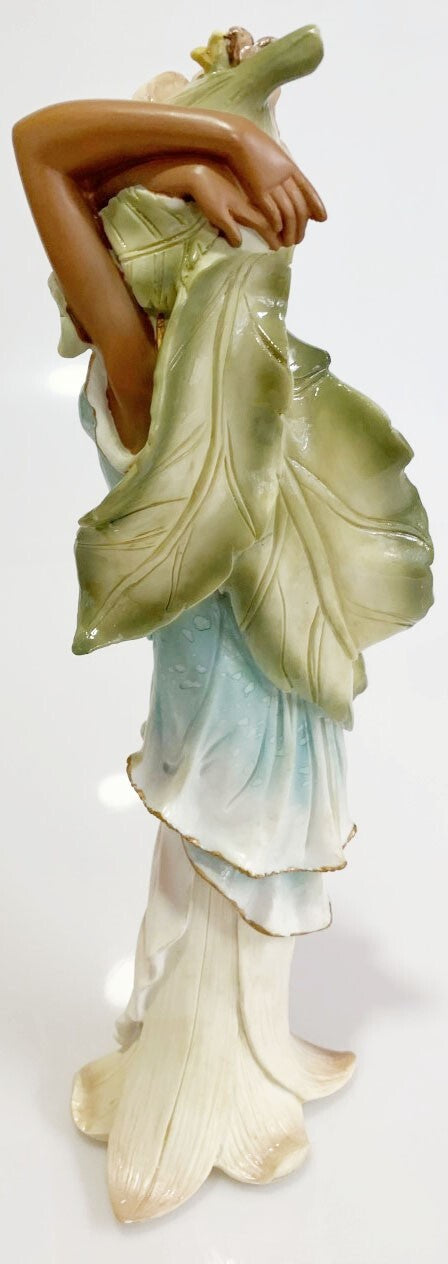YOUNG AFRICAN AMERICAN WOMEN IN BLUE VINTAGE FIGURINE WITH LARGE LEAVES 12"