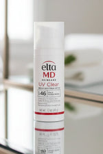 Eltma MD UV Clear sunscreen bottle on a white background