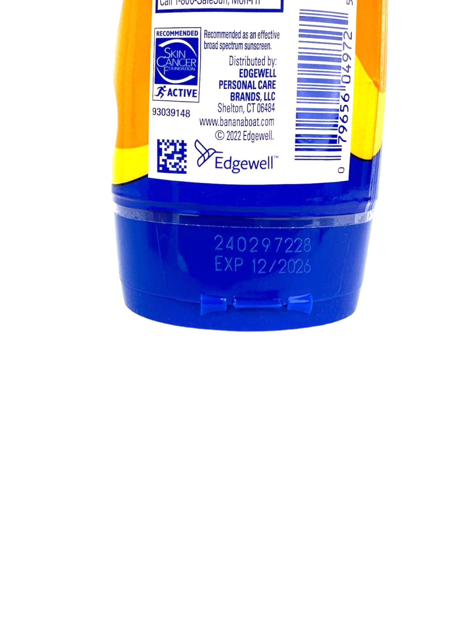 Back of a bottle with blue and yellow label, featuring Edgewell branding.