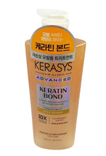 Keratin bond treatment bottle with visible branding on a white background