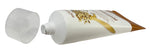 White tube of hand cream with a brown label on a white background