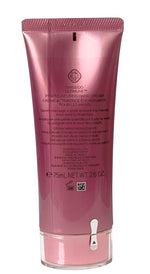 Pink hand cream tube on a white background