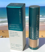 Colorescience Sunforgettable Brush-On Sunscreen with packaging on a beach background
