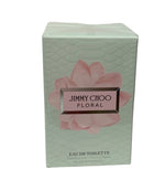 Jimmy Choo Floral perfume box with pink flower design on a light green background