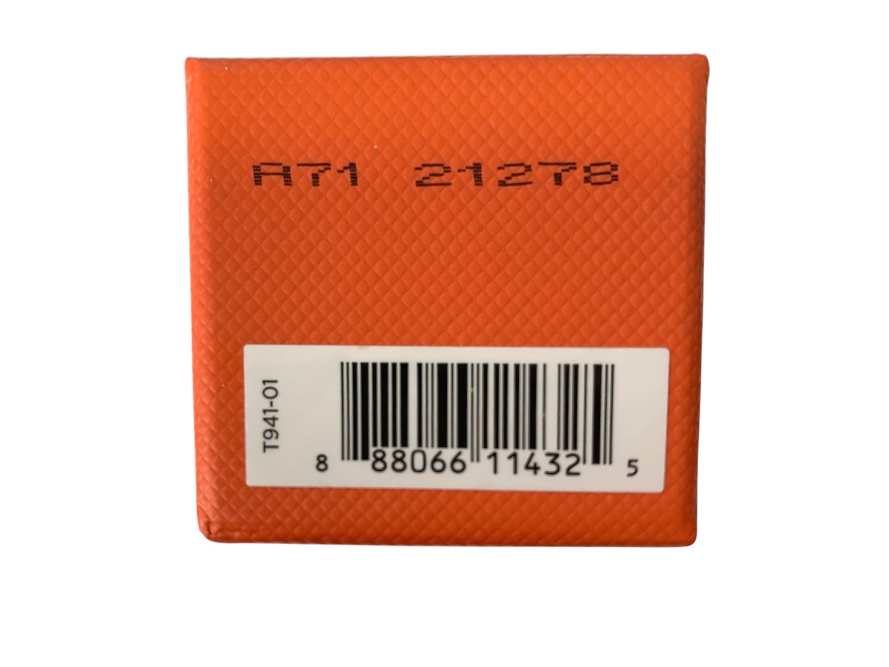 Orange textured box with a barcode label on a white background
